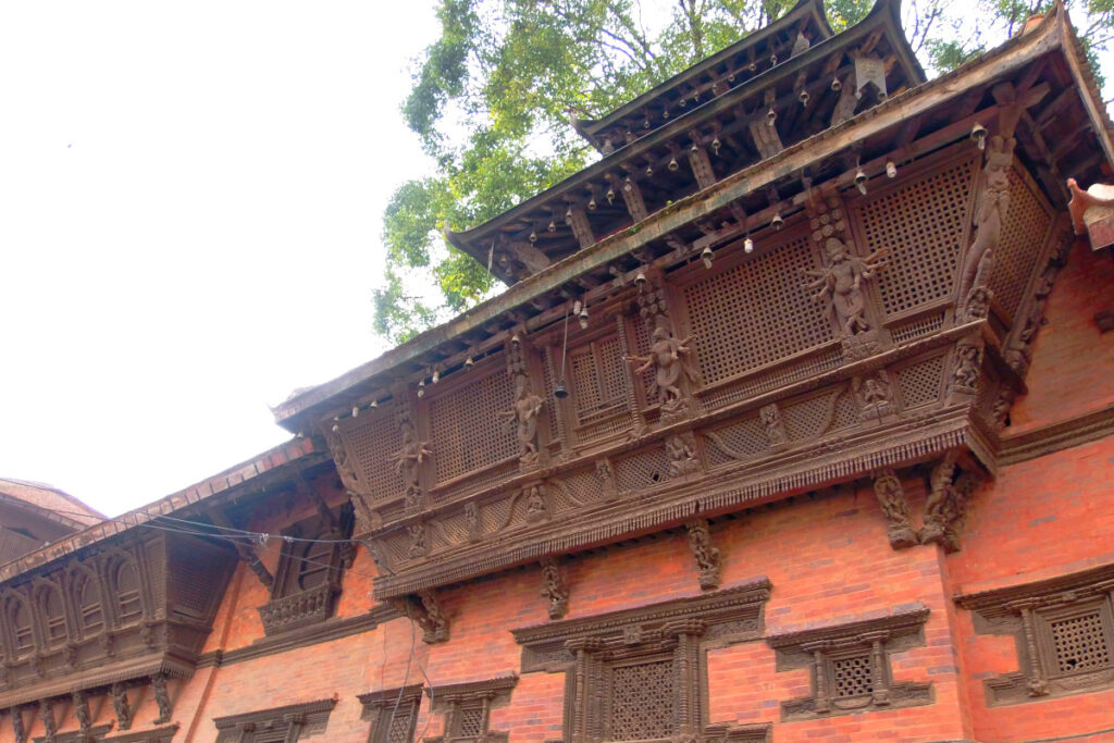 Kumari Ghar am Kathmandu Durbar Square Geschnitzte Holzfenster am Kumari Ghar in Kathmandu